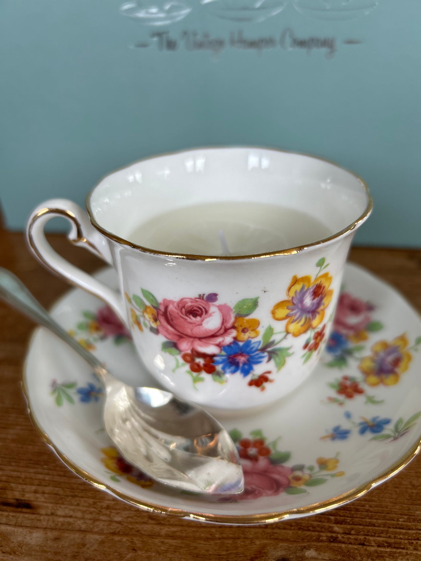A lovely vintage china cup and saucer candle -filled with Vanilla &`Honey scented soy .wax