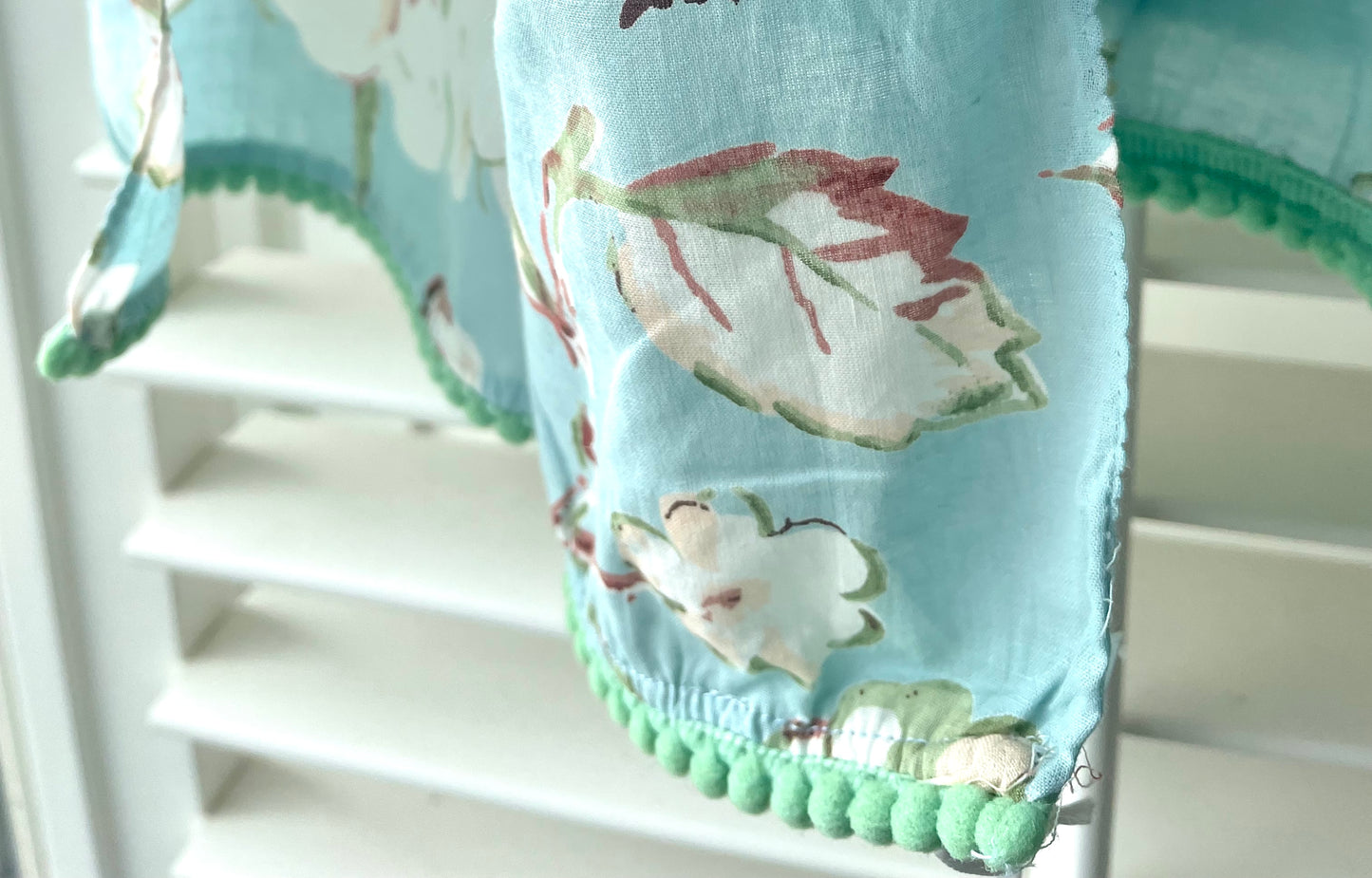 pom-pom trim on scarf