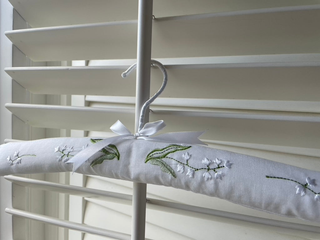 Embroidered padded coat hangers