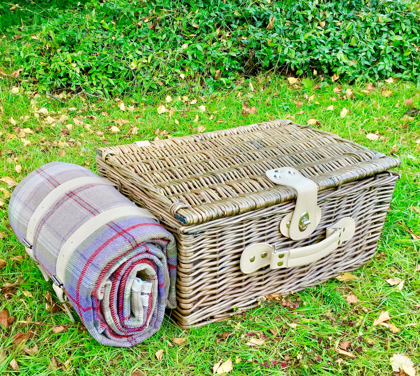 picnic hamper with tweed rug